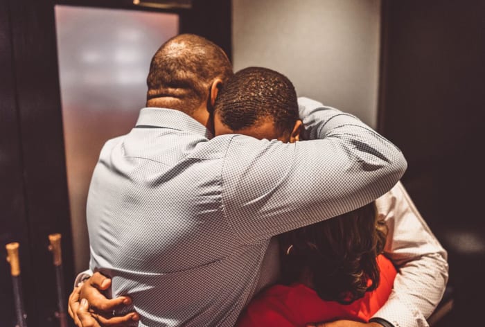 bradley-chubb-dinner-parents-hug.jpg